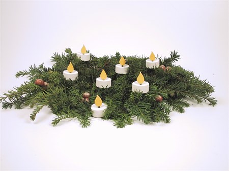 Värmeljus med låga antikvit